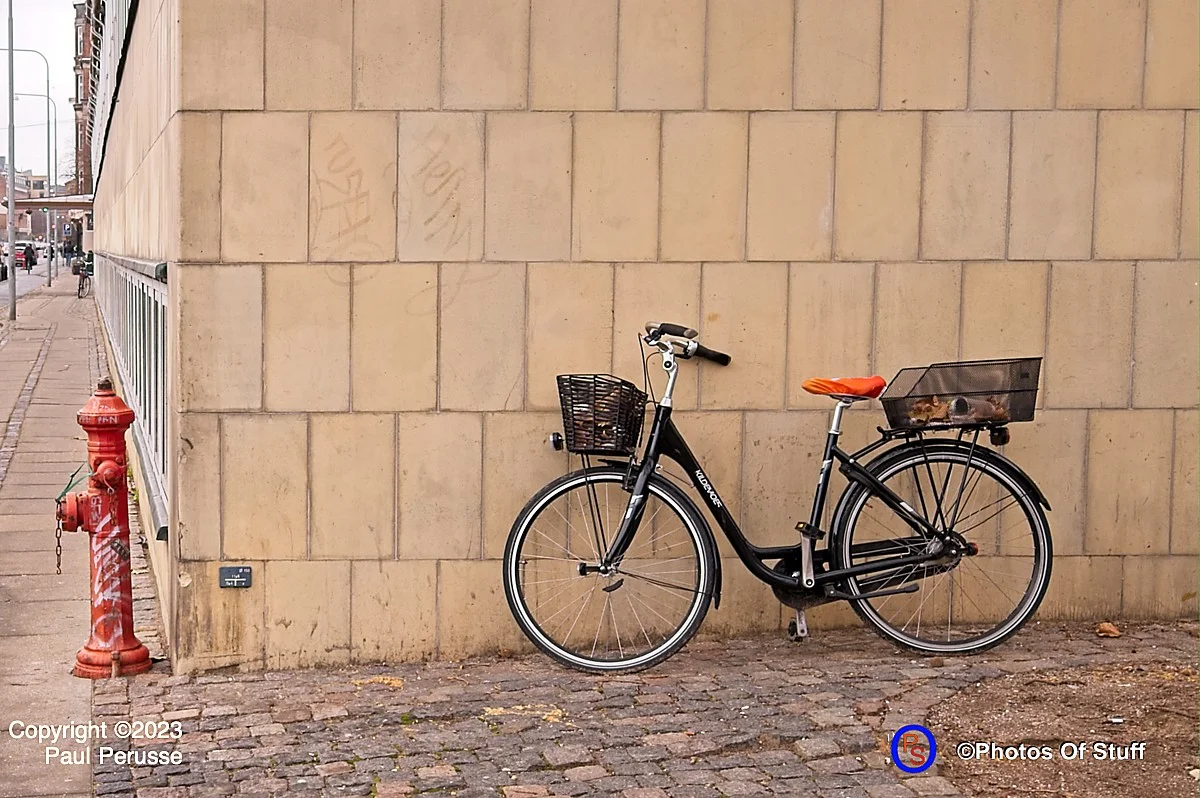 A Black Bike, a Yellow Wall, Revisited